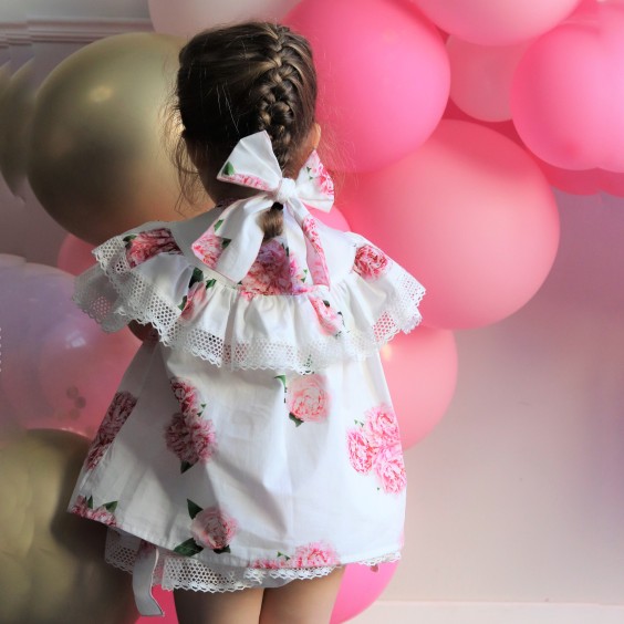 Blusa com folhos pe�nias