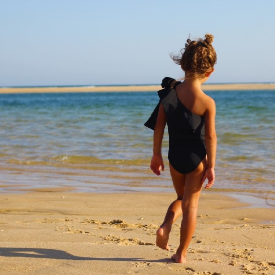 Black one shoulder swimsuit - girl