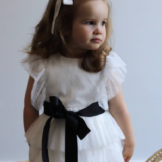 White tule dress with black bow