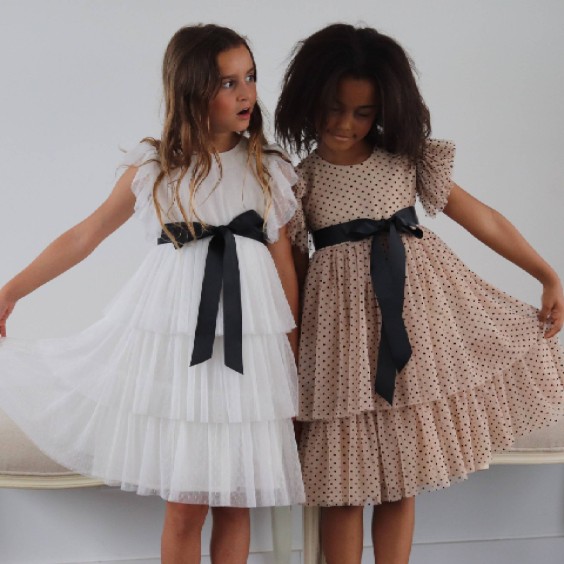 White tule dress with black bow