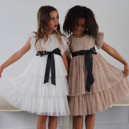 White tule dress with black bow White tule dress with black bow
