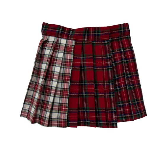 Jupe plissée en tartan rouge et blanc Jupe plissée en tartan rouge et blanc