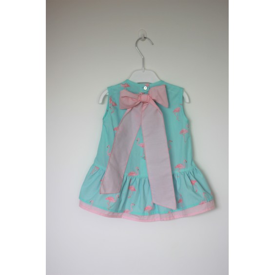 Tunica Flamingos lao atrs