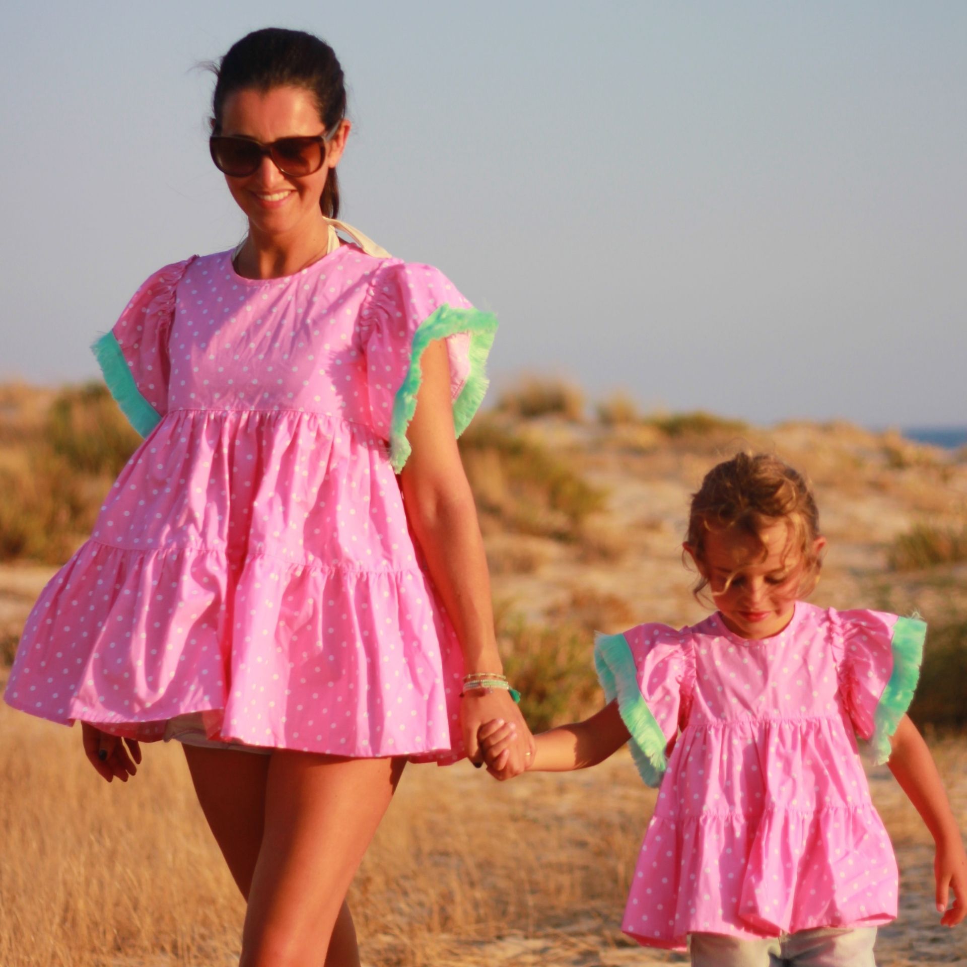 Tunica rosa bolas franja verde