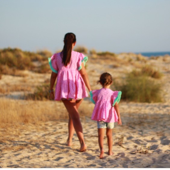 Tunica rosa bolas franja verde