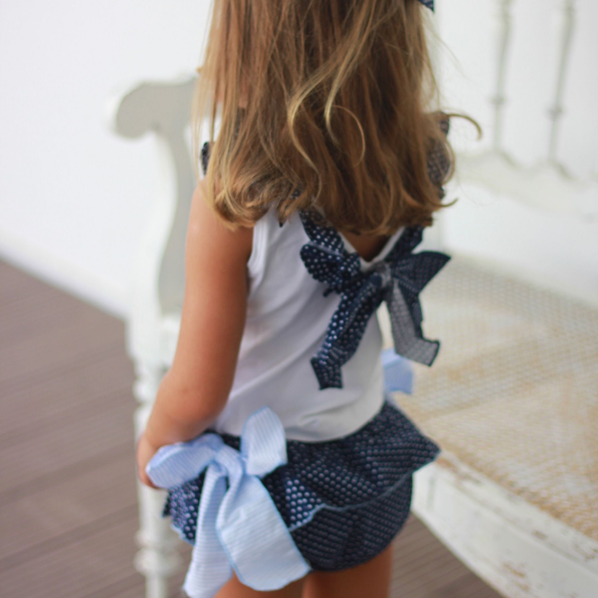 White tank top with Blue Stars bow