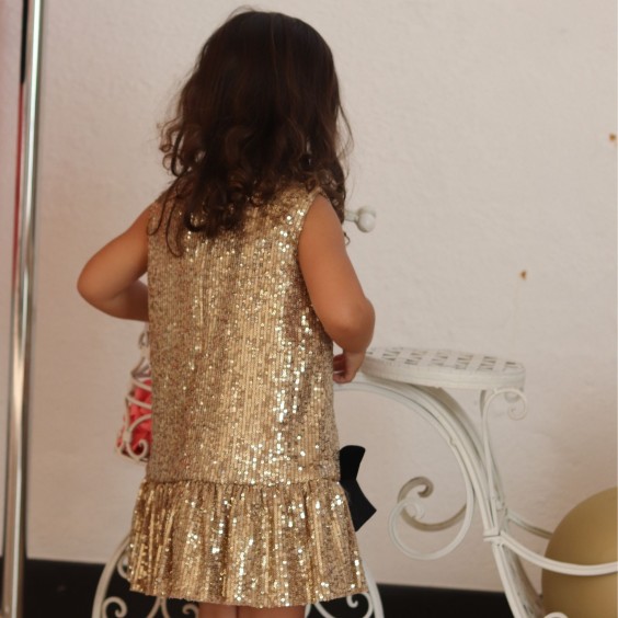Robe en paillettes avec noeuds devant