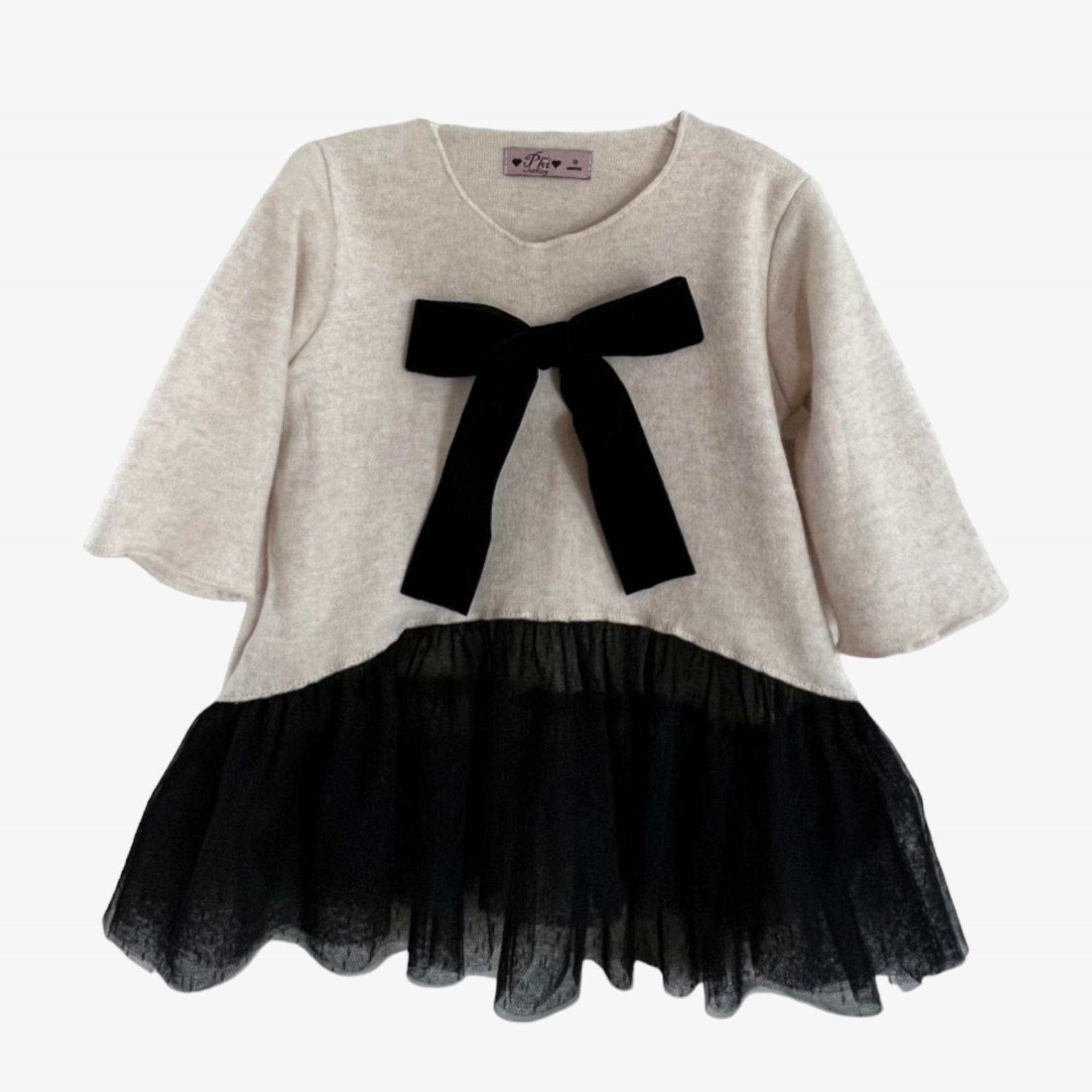 Pull avec n?ud et tulle