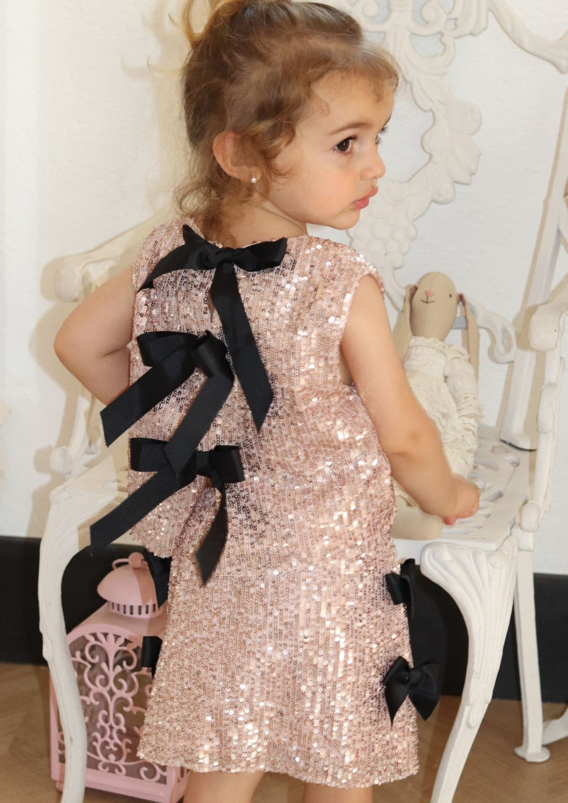 Saia lantejoulas rosa laços