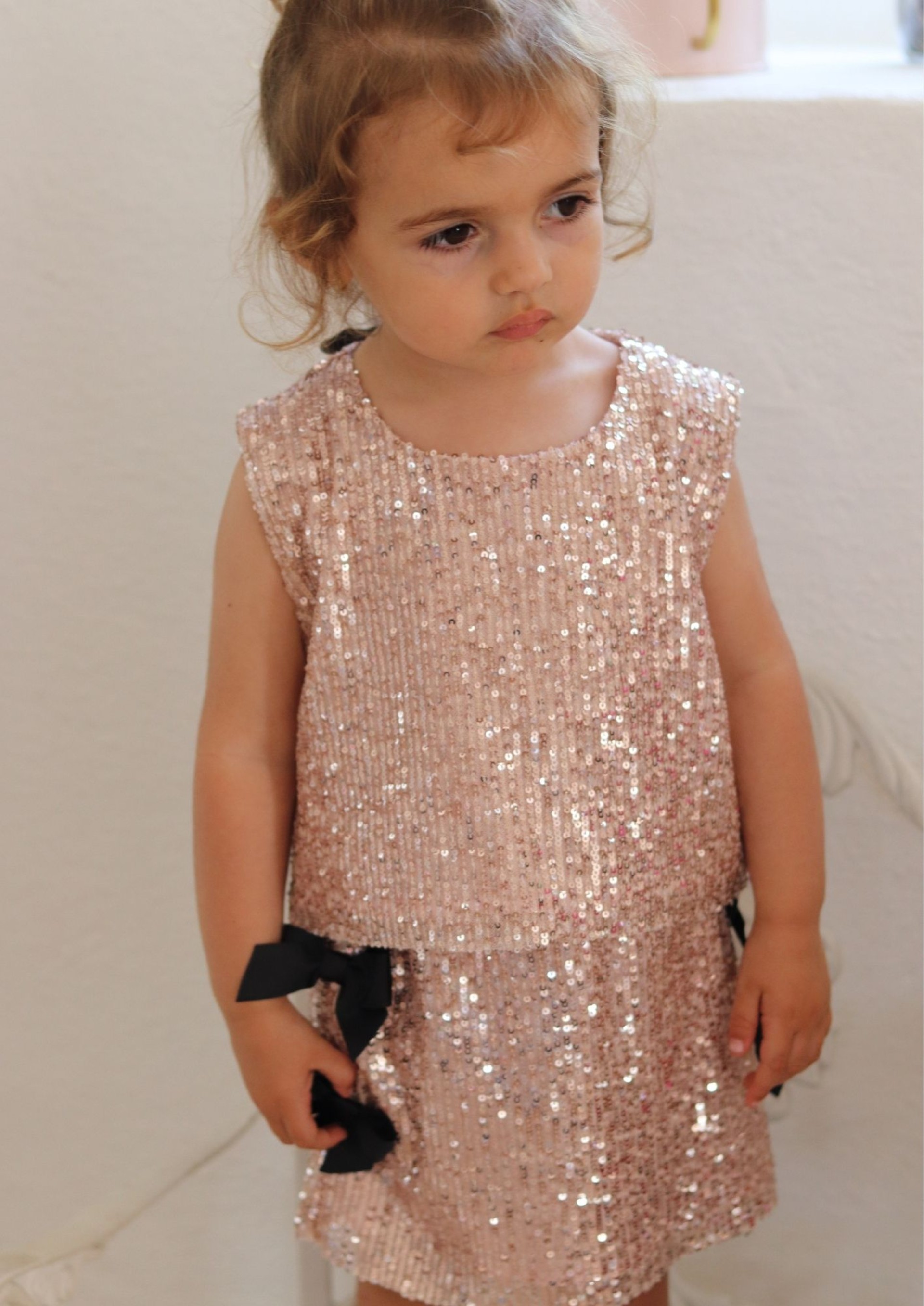 Saia lantejoulas rosa laços