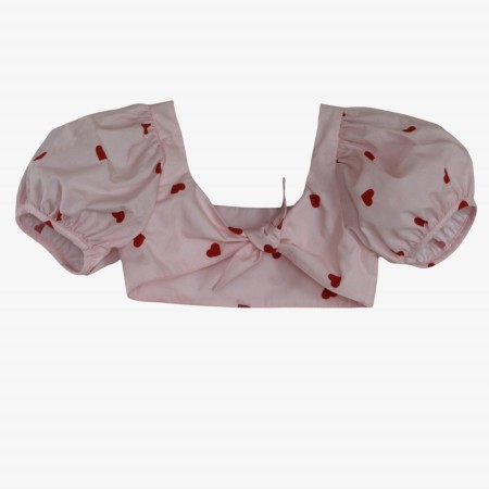 Haut rose avec des coeurs
