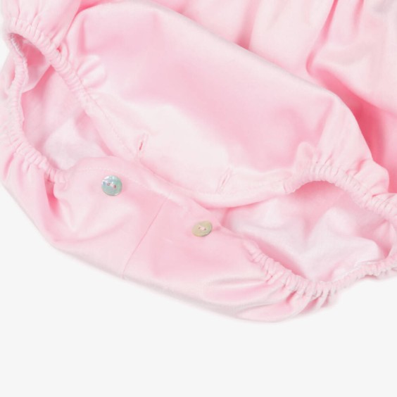 Pink velvet romper with bow
