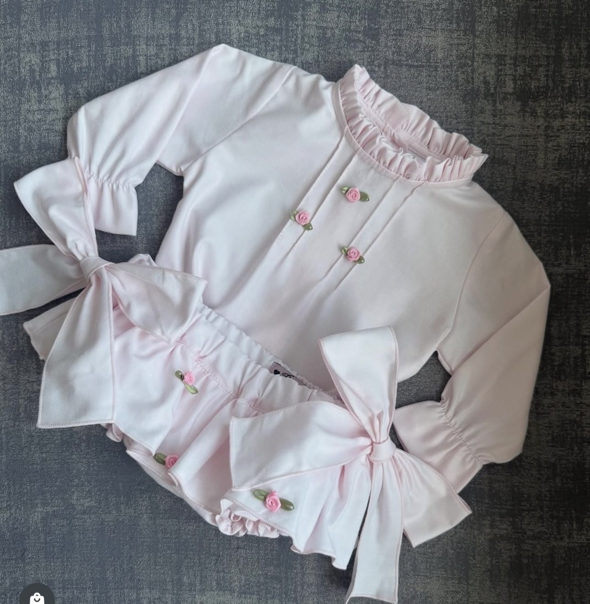 Blusa viela rosa com flores
