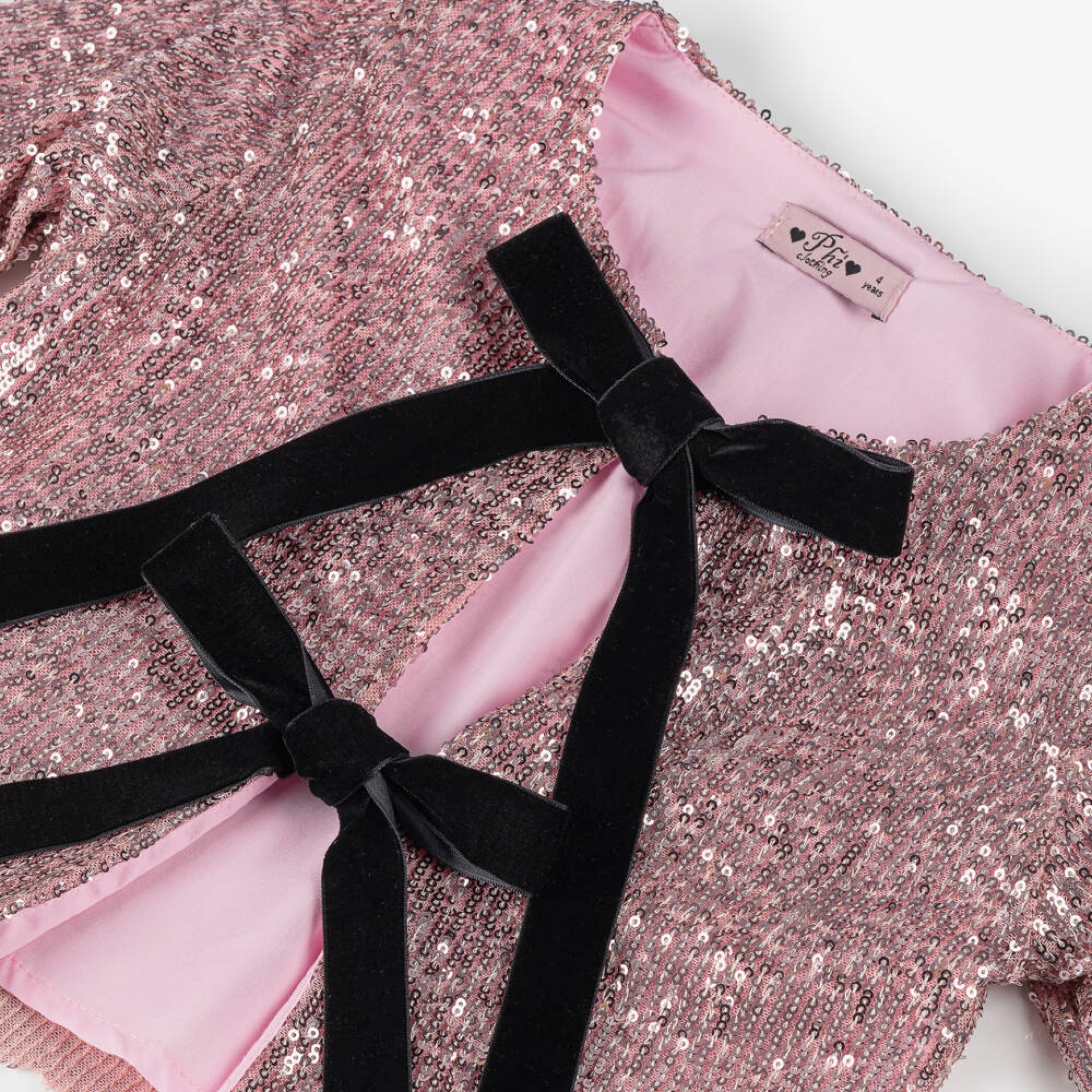 Pink sequined jacket with bows