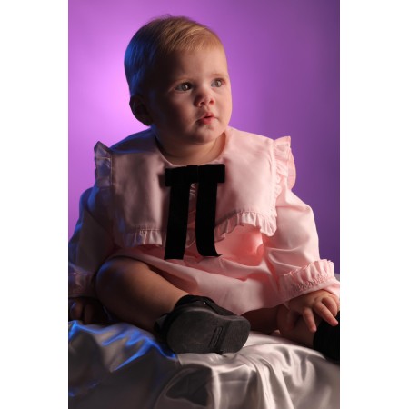 Pink blouse with black velvet bow. Pink blouse with black velvet bow.