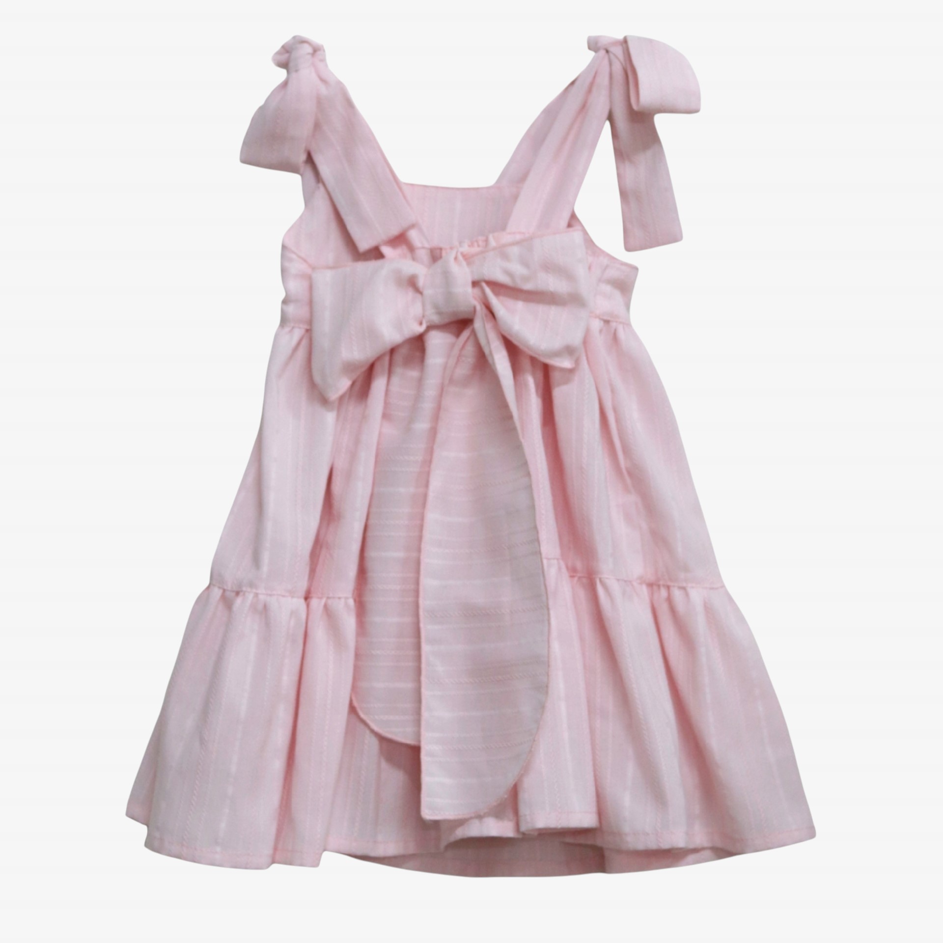 Robe rose avec des nœuds