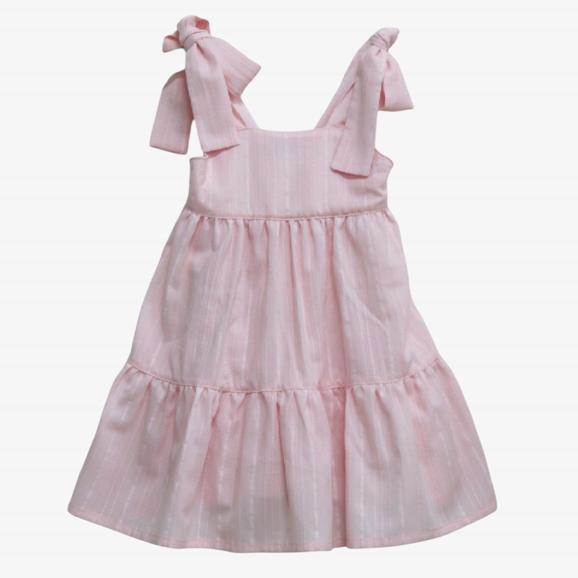 Robe rose avec des nœuds