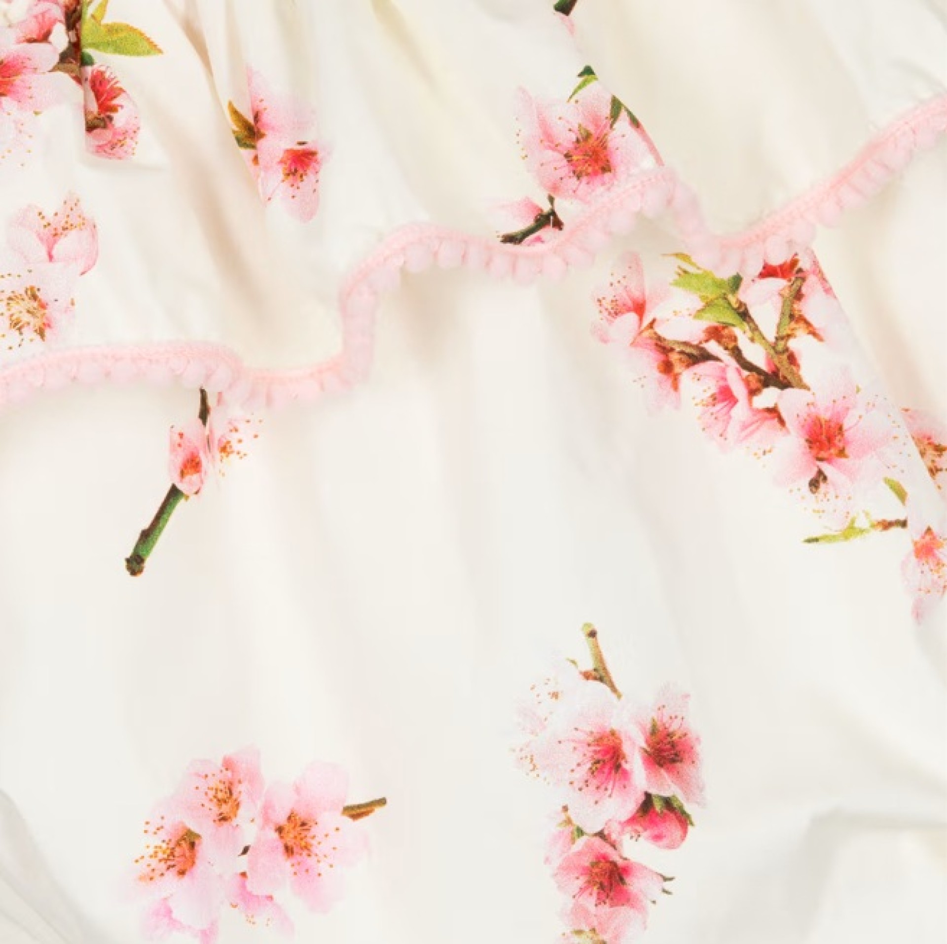 Cherry blossom romper with pompom