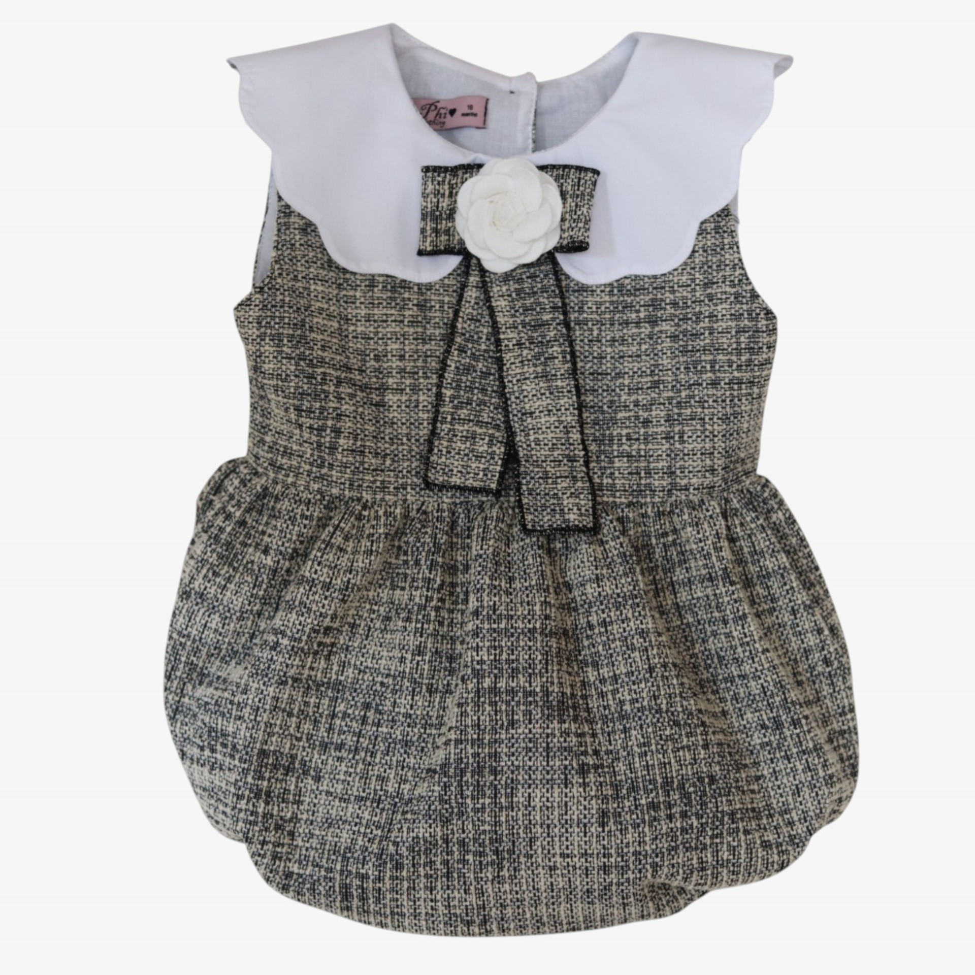 Black and ecru tweed romper with camellia