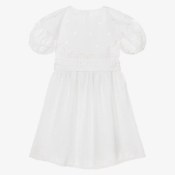 White dress with English embroidery and collar.