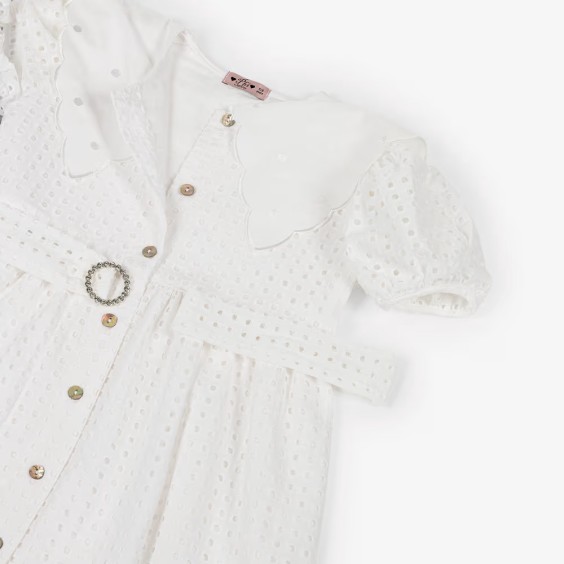 White dress with English embroidery and collar.