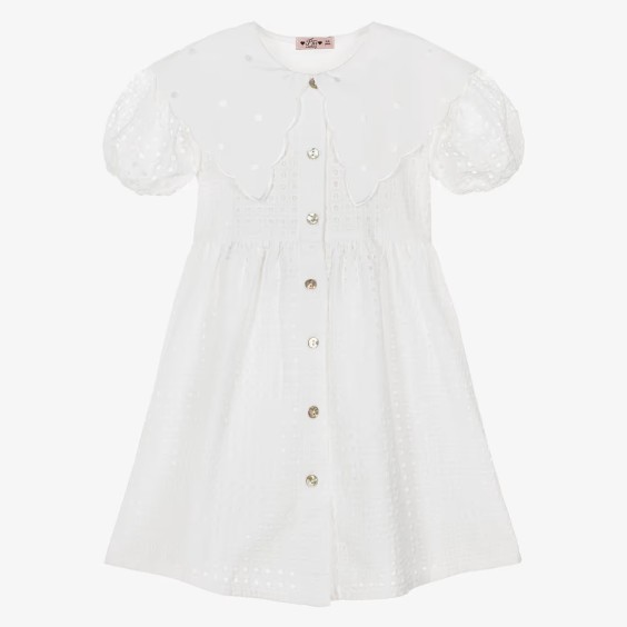 White dress with English embroidery and collar.