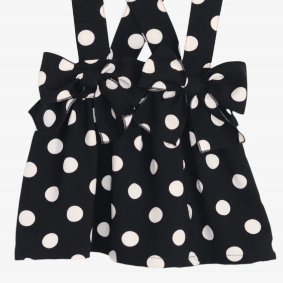 Black strap skirt with cream polka dots