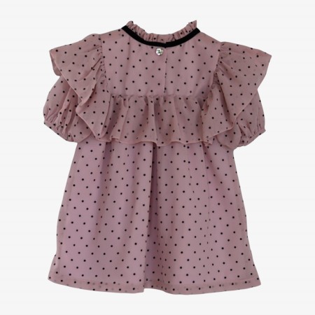 Pink voile dress with polka dots and a bow.