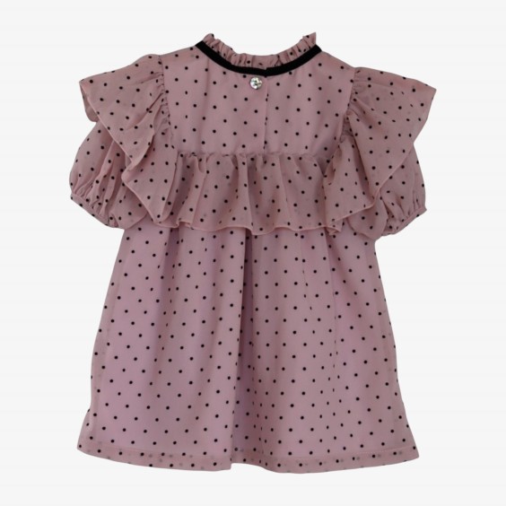 Pink voile dress with polka dots and a bow.