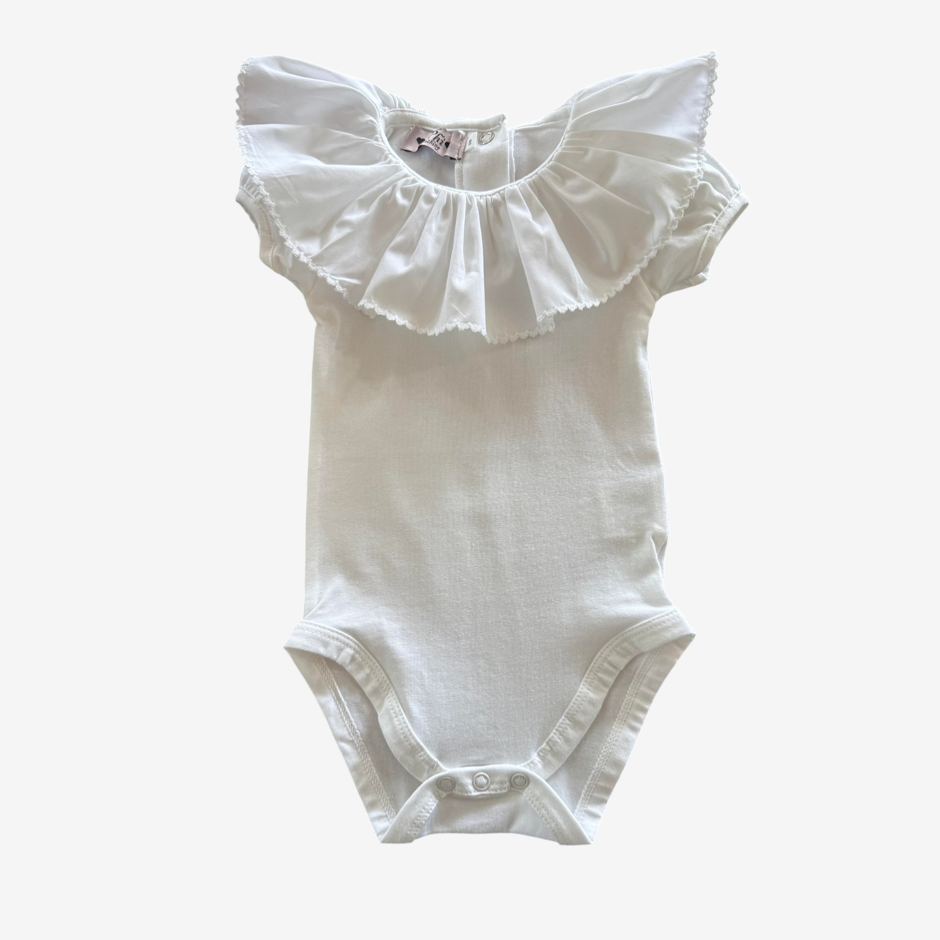 White bias-cut body/T-shirt with white picot trim.