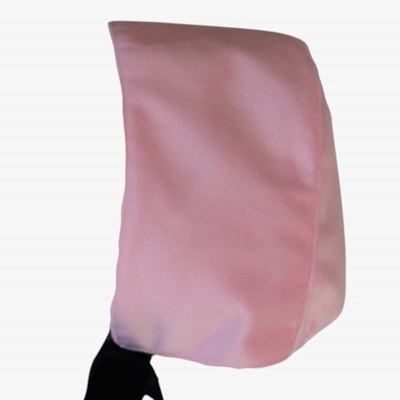 Pink bonnet with black velvet bow