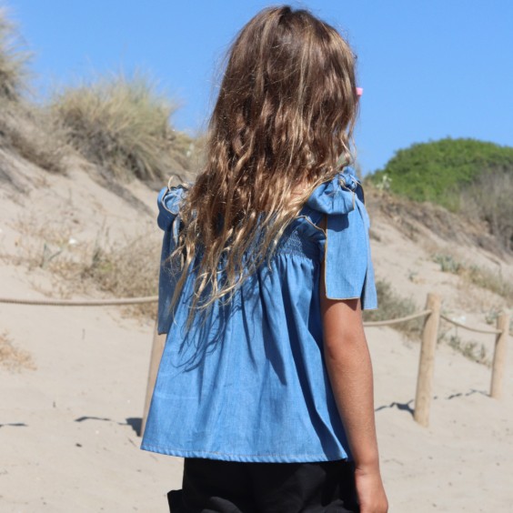 Denim blouse with bows