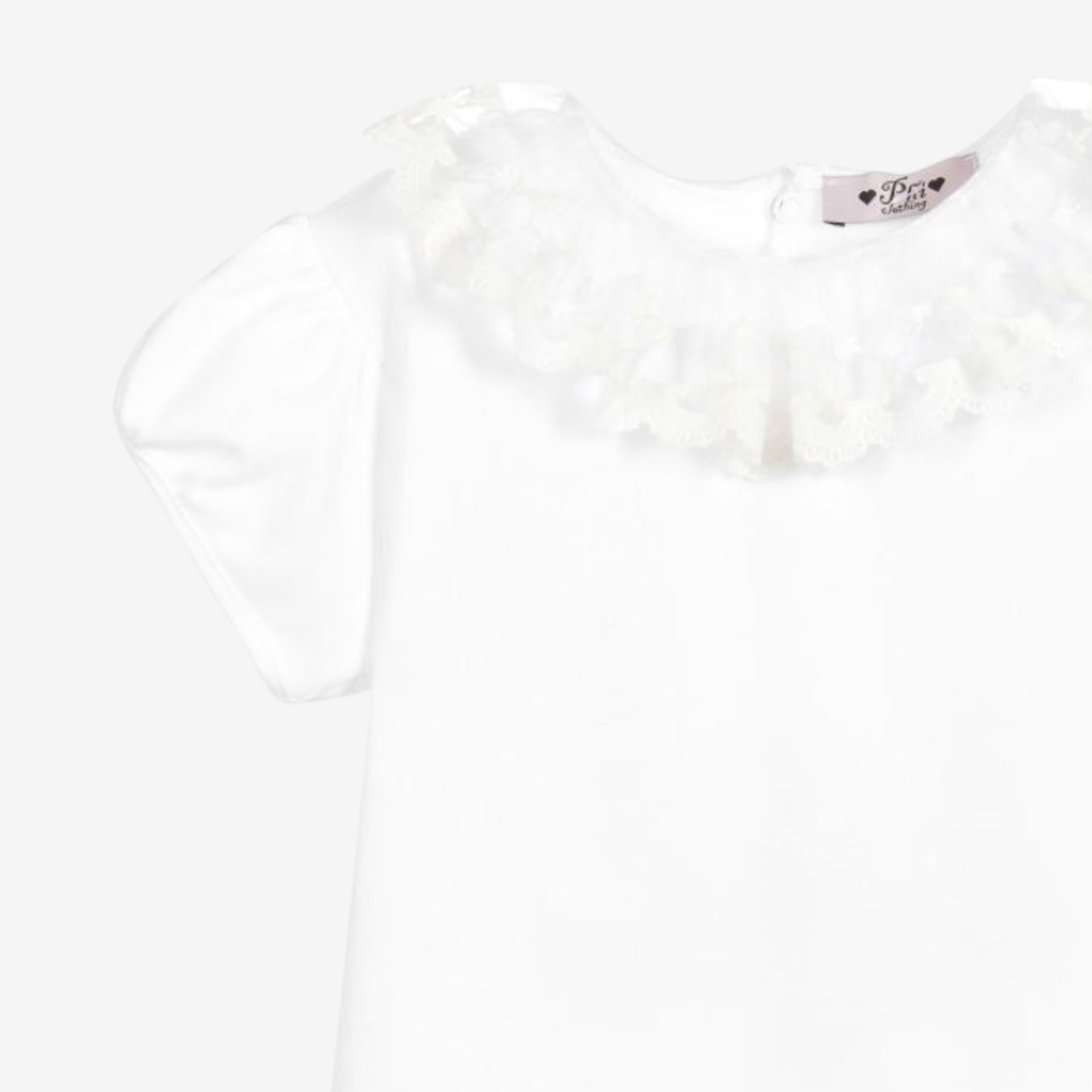 White bias-cut body/T-shirt with pink picot trim.