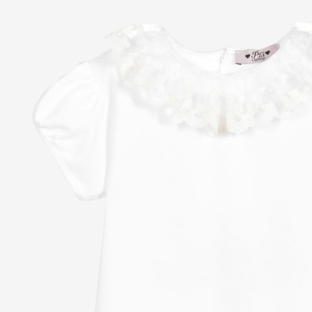 White bias-cut body/T-shirt with pink picot trim.