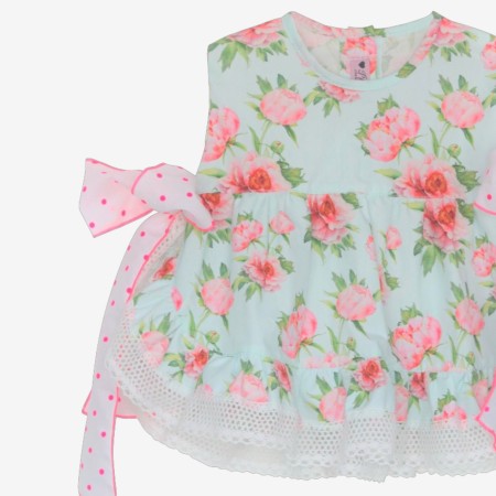 Mint-colored blouse with pink peonies and bows.