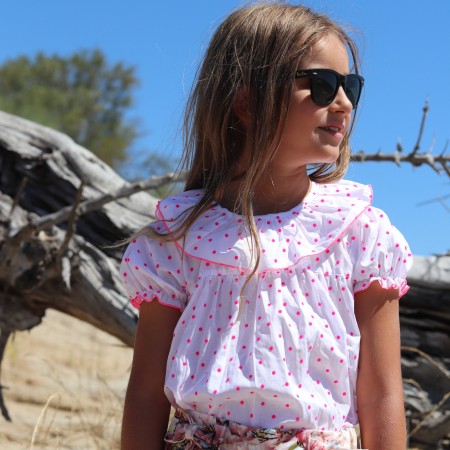 Blouse with pink polka dots
