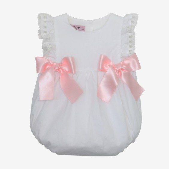 White romper with tulle and pink bows