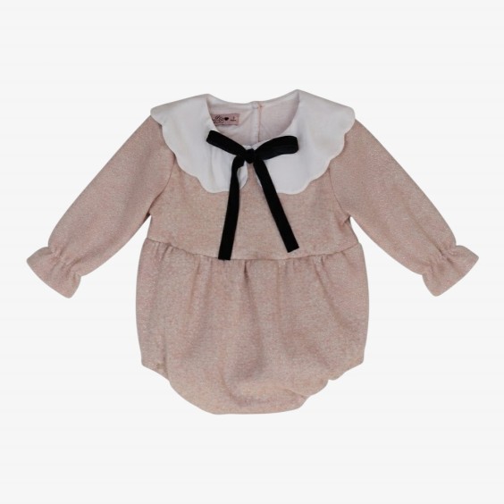 Pink knit romper with velvet black bow