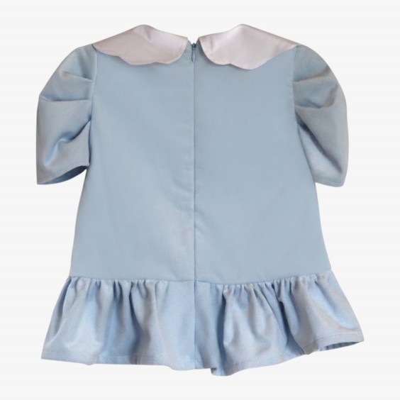 Baby blue dress with a pink bow.
