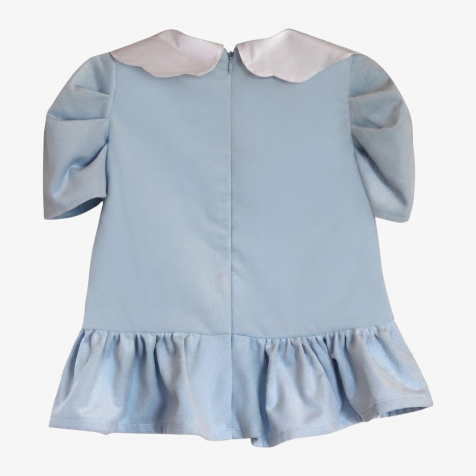 Baby blue dress with a pink bow.