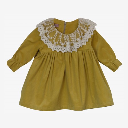 Yellow corduroy dress with tulle collar.