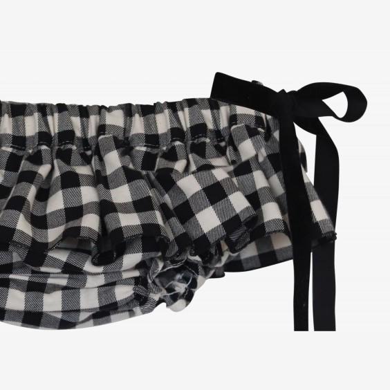 Bloomer carr�e noire et blanc cass� avec des n�uds en velours noir.