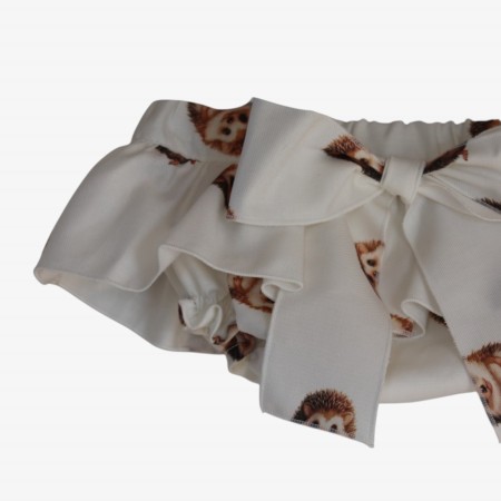 Ivory bloomer with hedgehog Ivory bloomer with hedgehog