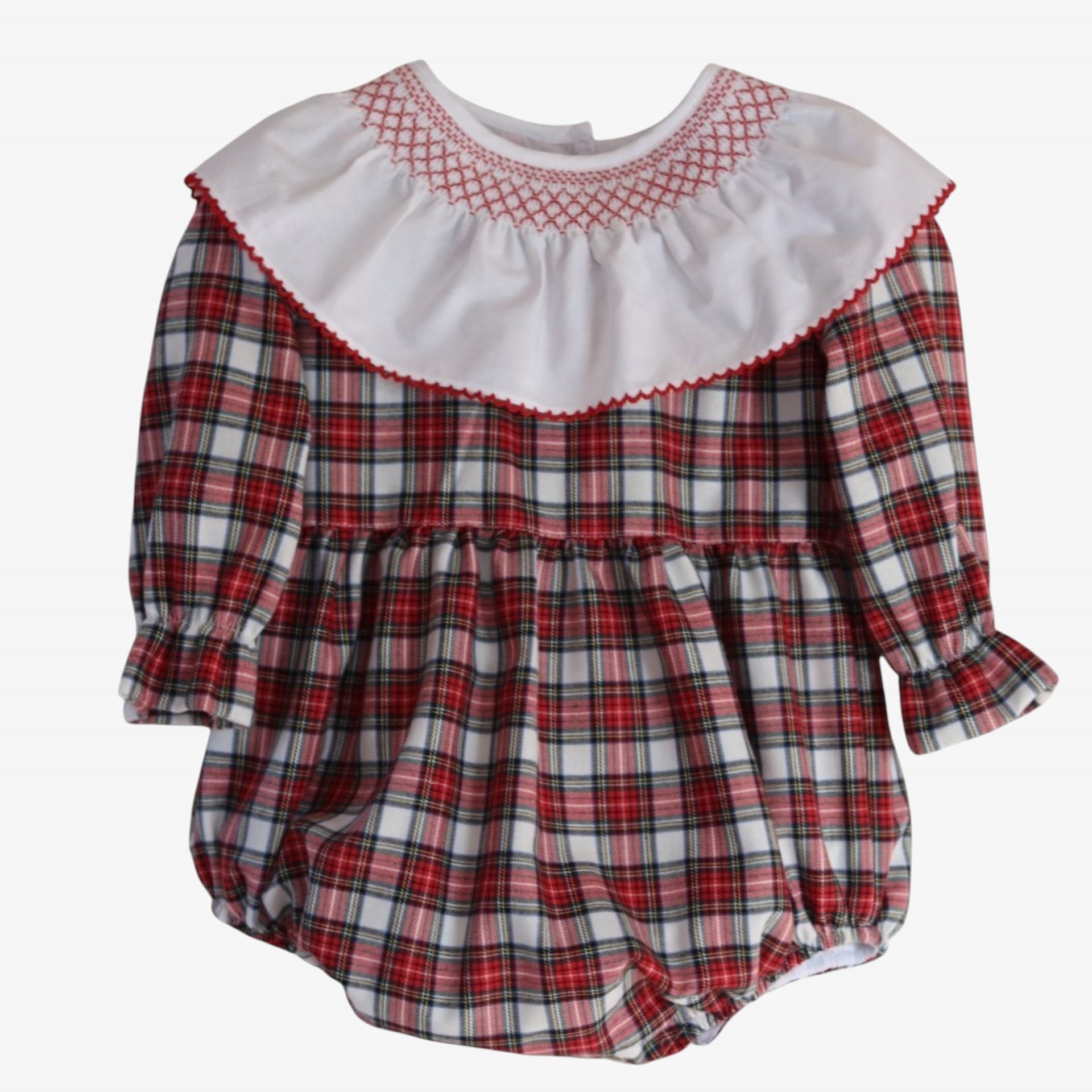 Barboteuse plaid rouge à carreaux avec détails smockés.