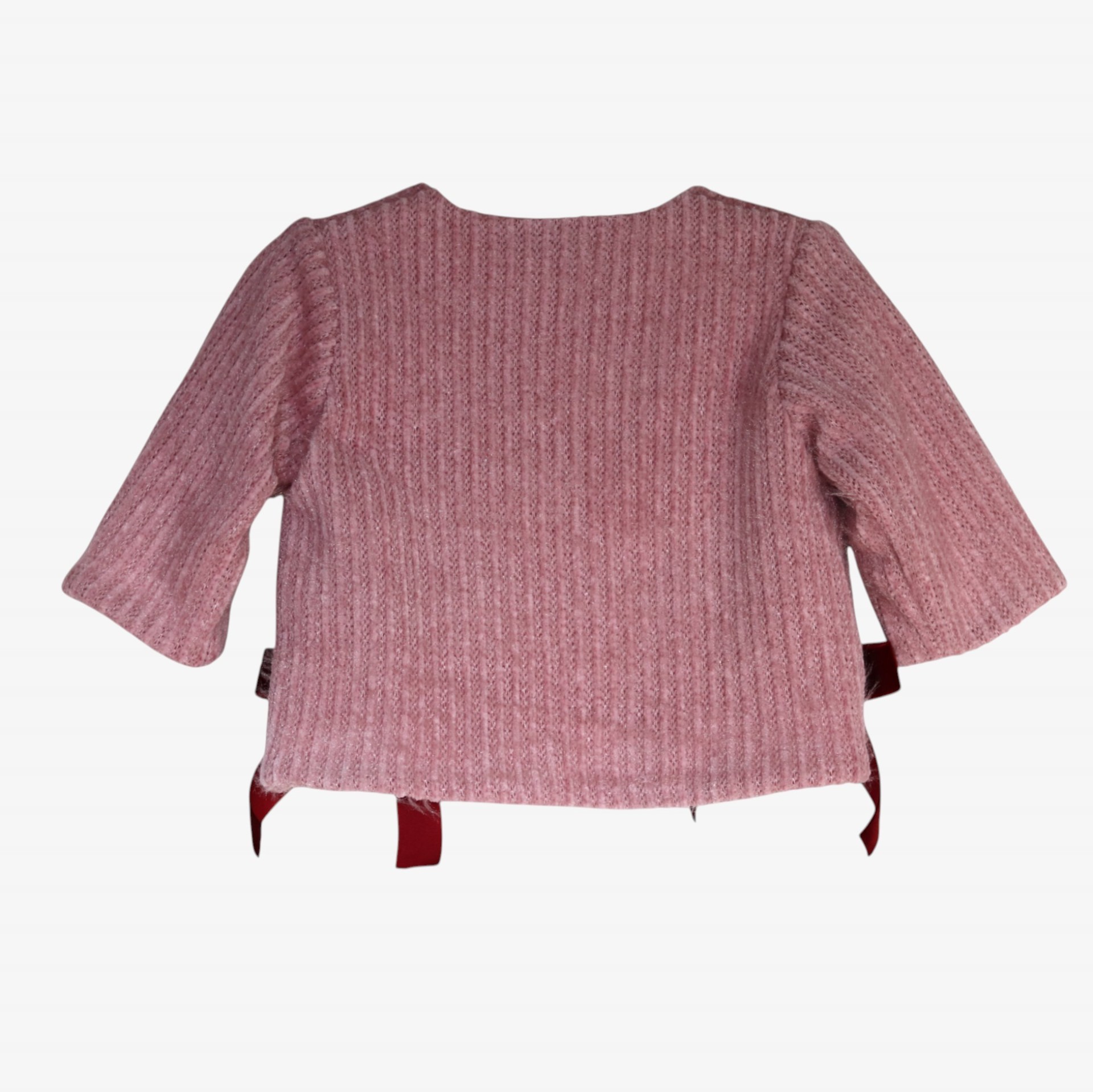 Pink knit sweater with burgundy velvet bows