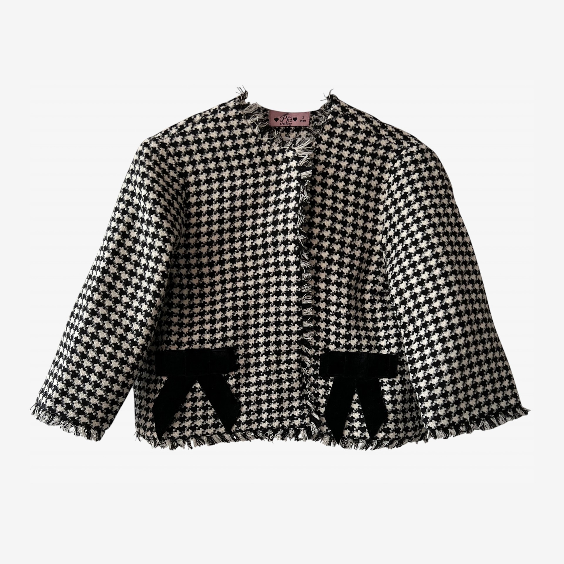 Black and white houndstooth coat