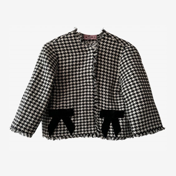Black and white houndstooth coat