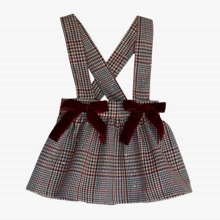 Cream and burgundy checkered skirt with straps and sequins.