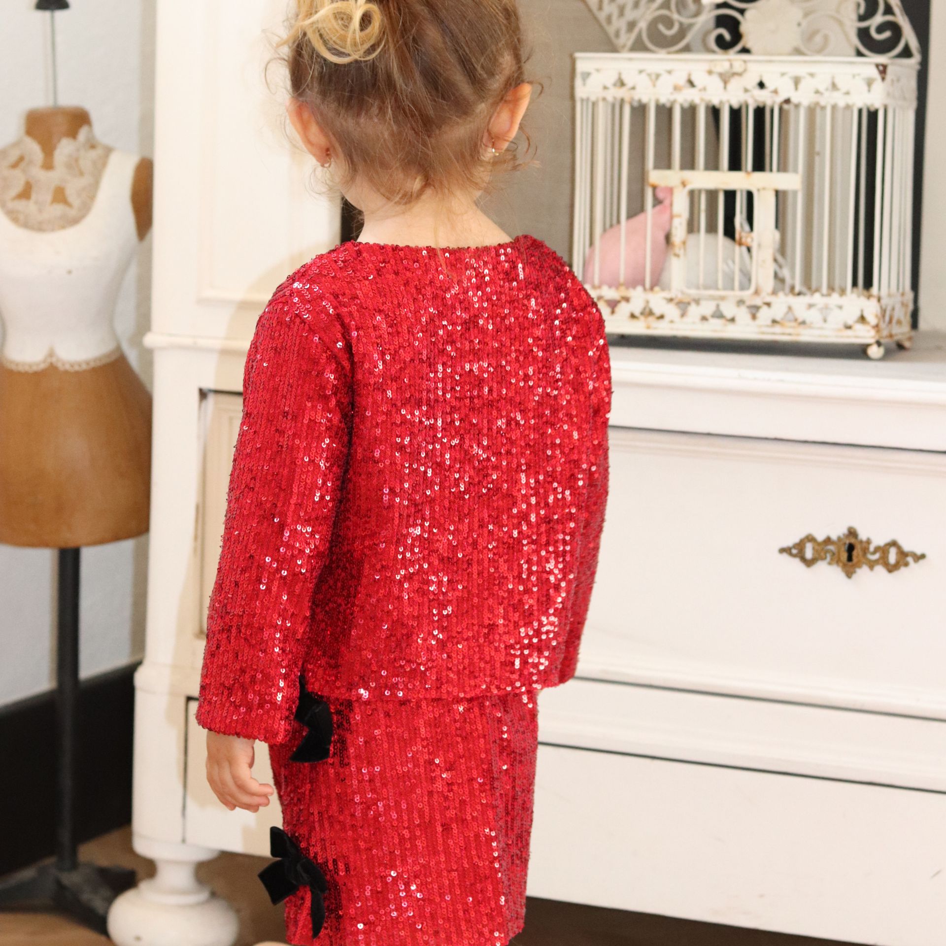 Burgundy sequined skirt with bows