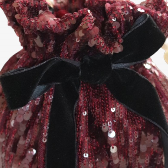 Bolsa de lantejoulas bordeaux com laço de veludo preto
